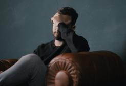 Person with head in hands