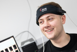Student in Psychology facilities with FNIR head equipment