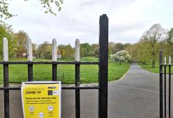 Coronavirus sign on park gate