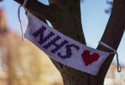 NHS banner on tree