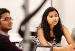 Business students working at a desk