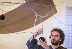 Student setting up equipment in the Acoustics Lab, University of Salford