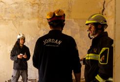 Mujtaba Ghulam onsite with two other search and rescue engineers