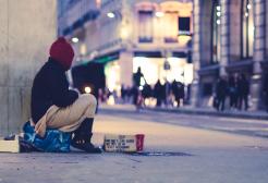 Person sitting on the street