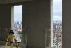 Building surveying equipment on a construction site