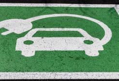 Parking space with battery charging logo