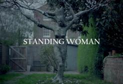 Screenshot of 'Standing Woman' short film statue in a garden