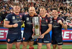 Salford student Jonny Lomax holding the super league trophy
