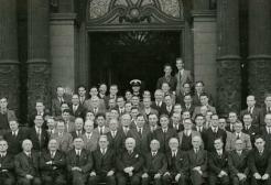 Archive image: A group of academics pose for a photo outside the Peel Building.