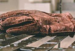 A glove left on a bench