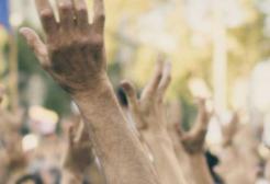 People with their arms in the air