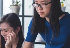 Three students working together