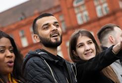 Salford's international students outside Peel building