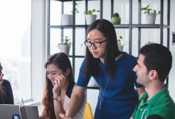 Three students working together