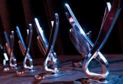 Table holding five alumni achievement awards
