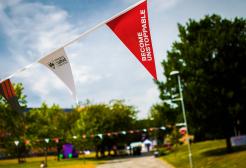 Open day bunting hanging in Peel Park, University of Salford