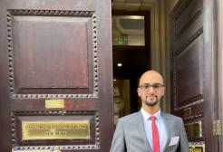 Abdul Rahman Sanhat, BEng Aeronautical Engineering graduate stood outside the Royal Aeronautical Society Building, London
