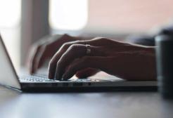 A person uses a laptop