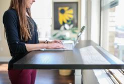 Woman at a standing desk