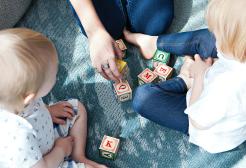Children playing with wooden blocks