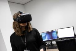 Psychology student using VR equipment