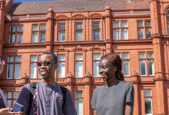 International students outside Peel building, University of Salford