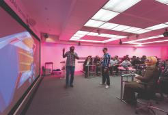 Group of people attending a THINKlab 3D presentation, University of Salford