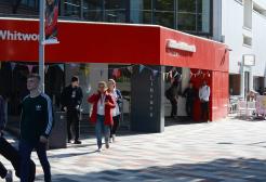 Students outside Clifford Whitworth Library, University of Salford