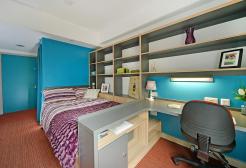 Bedroom interior in Peel Park Quarter accommodation