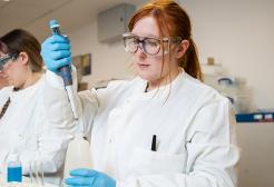 Two Science apprentices working in a science lab