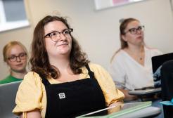 Three public services apprentices being onboarded in a room