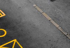 Car parking with double yellows and disabled sign