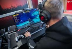 Man playing eSports game on computer