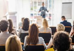 Back of the heads of students sat in lecture
