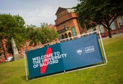 Welcome to the University of Salford signage on campus