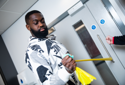 Male student undertaking a physiotherapy exercise