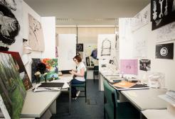 Student at desk in studio