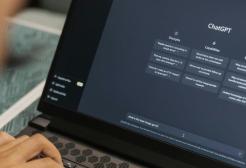 Man using ChatGPT on laptop