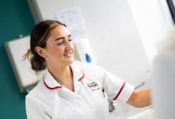 Student nurse in the Simulation Suite facility at the University of Salford
