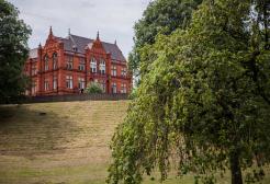 Rear of Peel Building against Peel Park with trees
