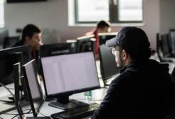 Student looking at a computer screen