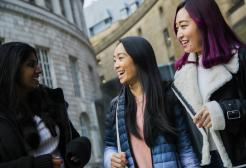 Students talking outside Manchester Central Library