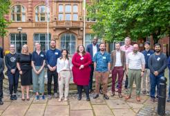 Group of University Fellows outside the University