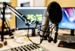 A microphone in front of a laptop at Bauer Media