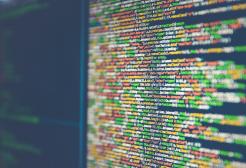 Computer code displayed on monitor screen