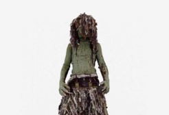 Clay sculpture of a women in ragged clothing