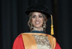 Ria Meera Munshi in graduation cap and gown at winter graduation 2024