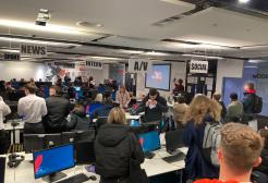 The MediaCity newsroom full of students 