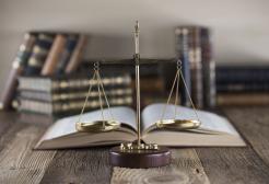 Law books and scales of justice