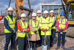Interim Dean of School Vicky Halliwell and Deputy Dean Jane McAdam with MP for Salford Rebecca Long Bailey and Kier representatives on a building site